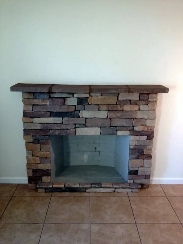 Stacked stone fireplace by Nick Lambdin Masonry