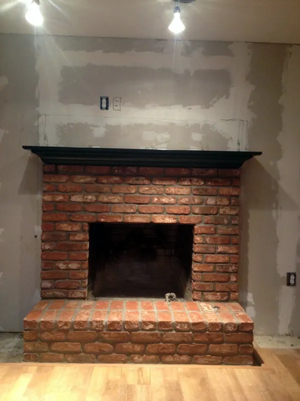 Brick fireplace by Nick Lambdin Masonry