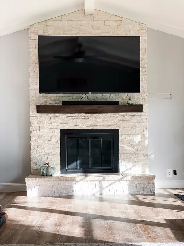 Whitewashed brick fireplace by Nick Lambdin Masonry