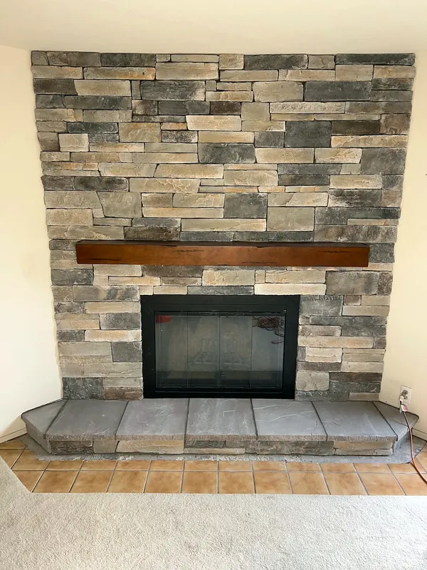 Ledgestone fireplace by Nick Lambdin Masonry