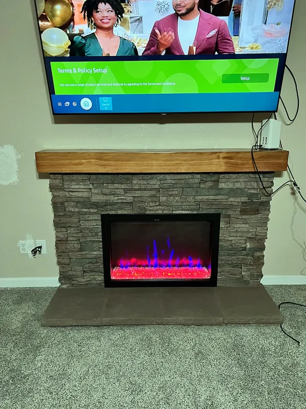 Stacked stone fireplace by Nick Lambdin Masonry