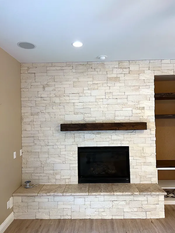 Ledgestone fireplace by Nick Lambdin Masonry