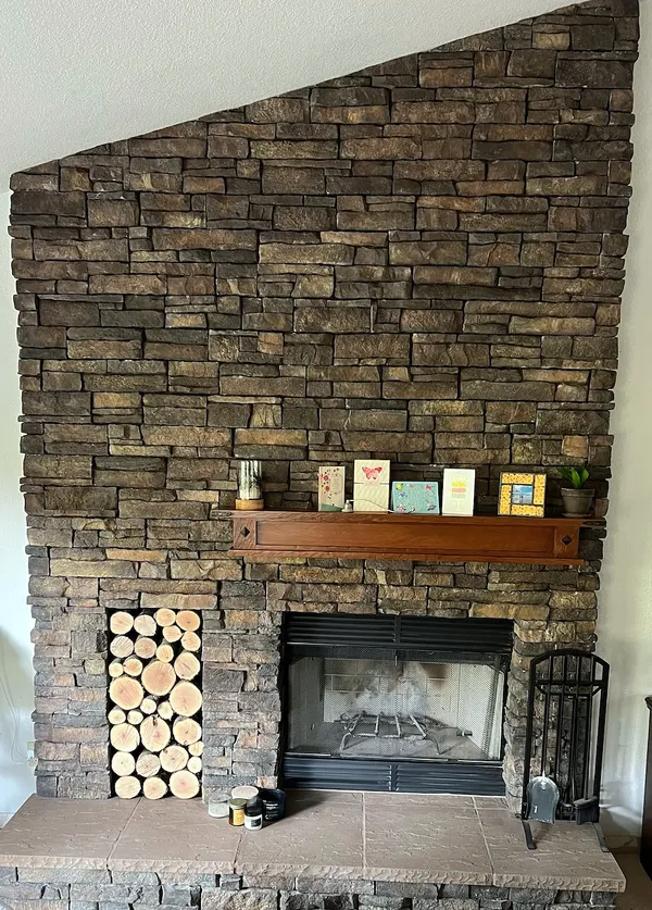 Stacked stone fireplace by Nick Lambdin Masonry
