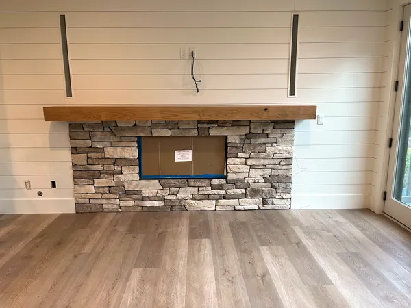 Stacked stone fireplace by Nick Lambdin Masonry
