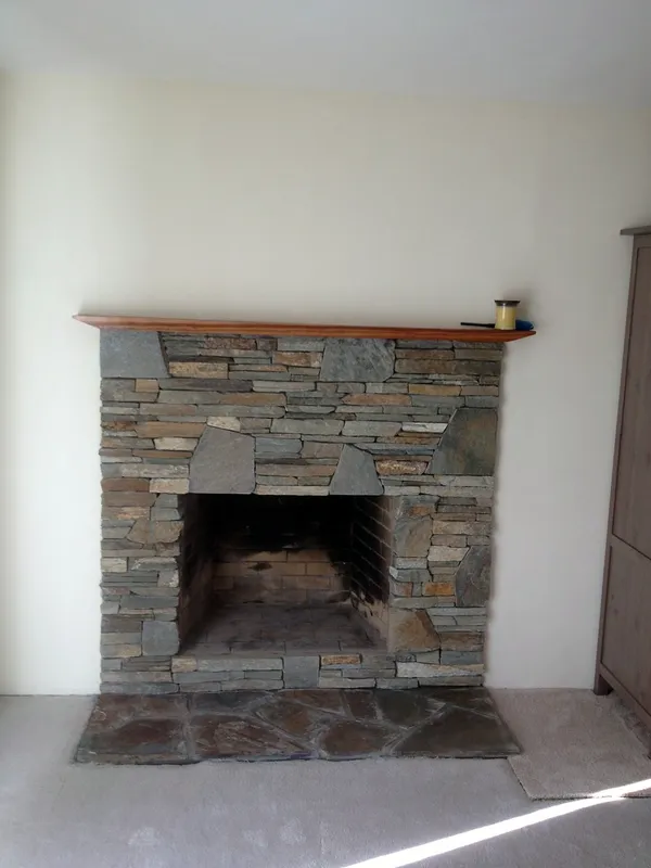 Natural ledgestone fireplace by Nick Lambdin Masonry