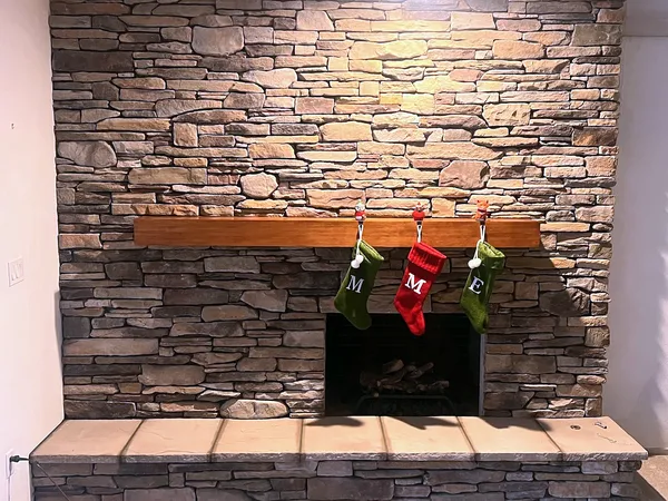 Stacked stone fireplace by Nick Lambdin Masonry