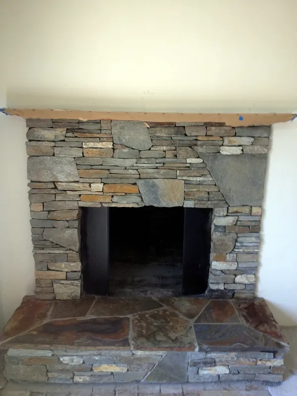 Natural stone fireplace by Nick Lambdin Masonry
