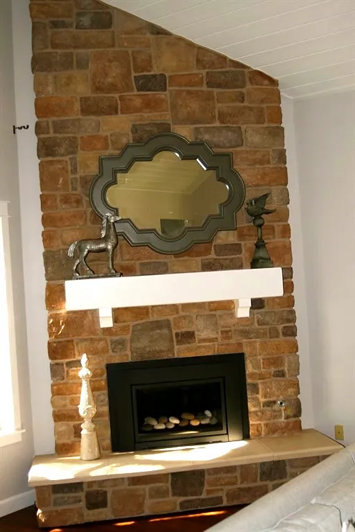 Stone veneer fireplace by Nick Lambdin Masonry