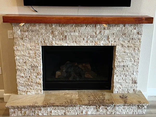Split stone fireplace by Nick Lambdin Masonry