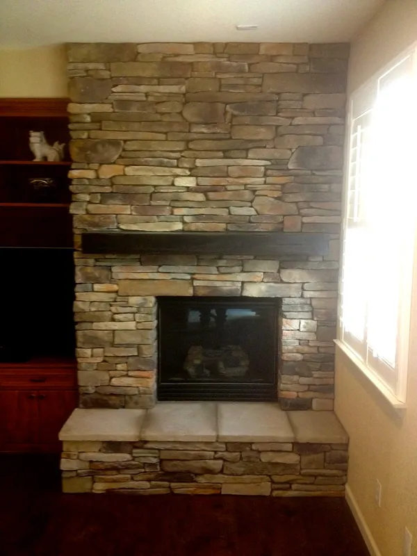 Stacked stone fireplace by Nick Lambdin Masonry