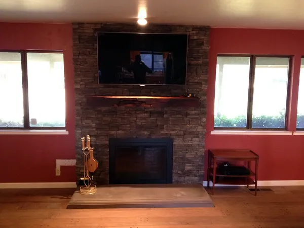 Stacked stone fireplace by Nick Lambdin Masonry