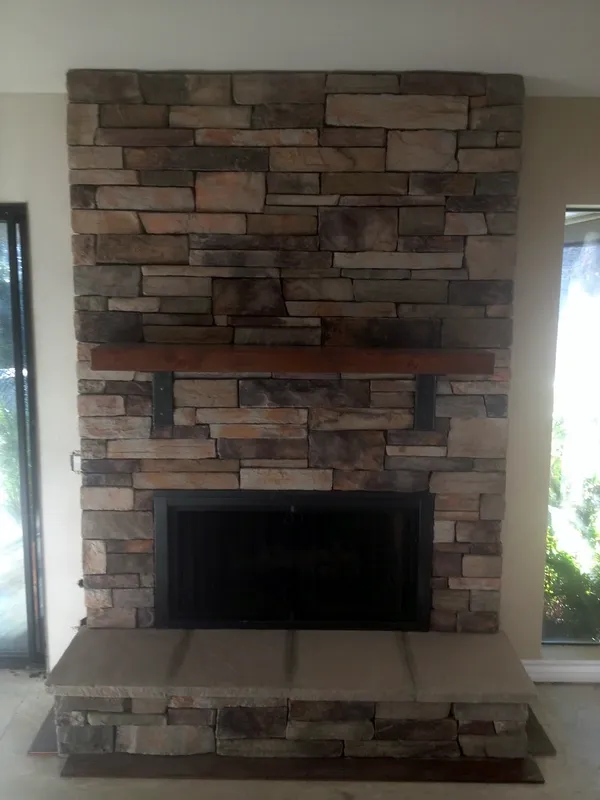 Stacked stone fireplace by Nick Lambdin Masonry