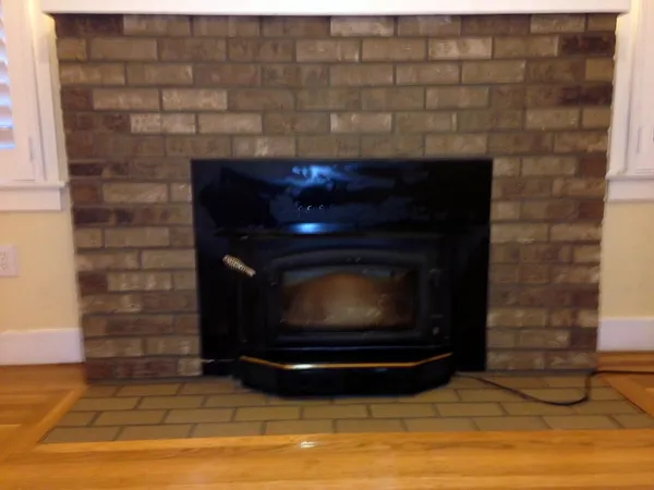Brick fireplace by Nick Lambdin Masonry