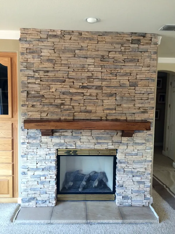 Stacked stone fireplace by Nick Lambdin Masonry