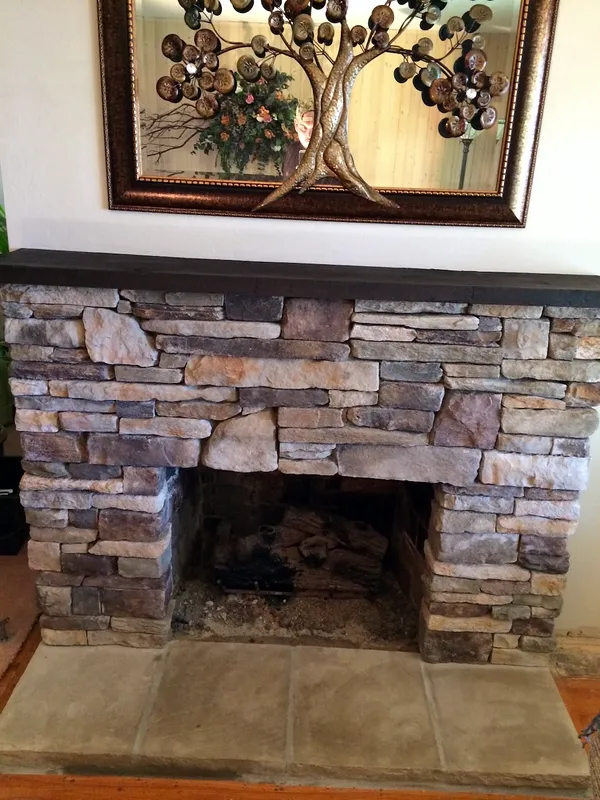 Stacked stone fireplace by Nick Lambdin Masonry