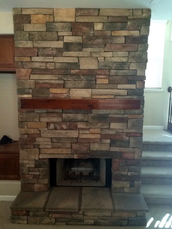 Stacked stone fireplace by Nick Lambdin Masonry